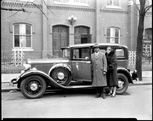 Dr. and Mrs. E.C. Smith w/ car. [Acetate film photonegative]