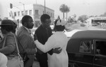 Bishop J. A. Blake, Jr. is comforted by an attendee of his father's funeral, Los Angeles, 1984