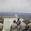 Thumbnail for Officer instructing soldiers outside at the U.S. Army training facility at Fort McClellan near Anniston, Alabama.