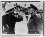 Sessue Hayakawa and Alec Guinness in a scene from "The Bridge On The River Kwai" opening at Loew's Circuit October 29th