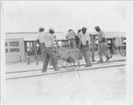 Pouring concrete for Bayshore Seawall, Tampa, Florida, October 27, 1936