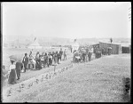 Group of Indians and whites entering fair grounds. U. S. Indian School, St Louis, Missouri 1904