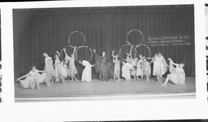 Classic Dancers of the Mabel Jones Studio [on stage, holding hoops : acetate film photonegative and paper print]