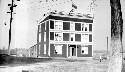 St. Paul's School. Sign on building reads, Long Island Domestic Science Building, 1897