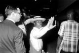 Roosevelt Barnett and other men on a sidewalk during a civil rights demonstration in downtown Montgomery, Alabama.