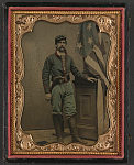 [Unidentified soldier in Union uniform with American flag]