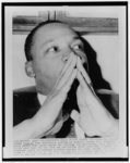 [Dr. Martin Luther King, Jr., bust portrait, facing right, in Boston's Jordan Hall waiting for police to search building for explosives]