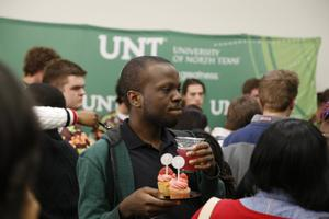 Man in crowd at 20th Anniversary