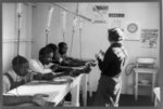 Georgia, 1937(?)--A group of Black men receiving intravenous treatment in a Georgia venereal disease clinic