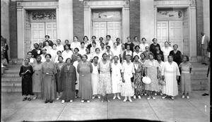 Women on steps of Garnet-Patterson Junior High School, people at side of photograph] [cellulose acetate photonegative