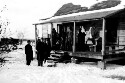 Unidentified men at a house