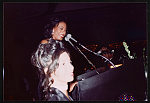 [Woman speaking at microphone during Brotherhood Crusade tribute to Rosa Parks and Muhammad Ali, Los Angeles, California, 1994]