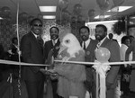 Thumbnail for Chicken George ribbon cutting participants posing together, Los Angeles, 1985