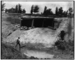 Work on a culvert for the new River des Peres channel during exposition construction