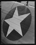 Thumbnail for Production. Airplane maufacture, general. The symbol of democracy, newly painted on a heavy bomber at the Long Beach, California, plant of Douglas Aircraft Company, brings hope to enslaved people in Axis-dominated lands. Most important are the many types of aircraft made at this plant are the B-17F ("Flying Fortress") heavy bomber, the A-20 ("Havoc") assault bomber and the C-47 heavy transport plane for the carrying of troops and cargo