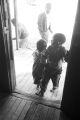 Young son and daughter of John Nixon, on the front porch of their home in Autaugaville, Alabama.