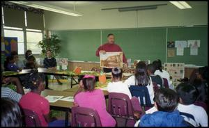 Male Speaker and Gates Elementary Students