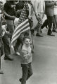 Kid holding flag at poor people's march