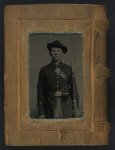 [Two portraits of an unidentified man, one in jacket and tie, the other in Union uniform and slouch cap with bayoneted musket, scabbard, and cap box]