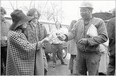 Sanitation workers strike, strike supporters outside in downtown Atlanta, Georgia, March 20, 1970. This is part of a series labled "Garbage Strike."