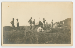 Photographic postcard of Charles Wilbur Rogan with his unit in the Philippines