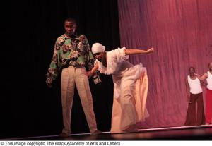 Dancer in white dress with groom dancer