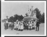 [Group of school children in front of statue of George Washington, Washington, D.C.]