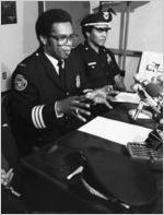 Police Chief George Napper during a press conference, 1982