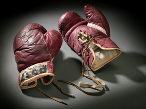 Training boxing gloves used and signed by Cassius Clay