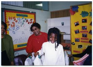 Student and Teachers at Gates Elementary Christmas Party