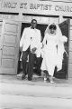 Walter Bradley and Josephine Bradford leaving Holt Street Baptist Church in Montgomery, Alabama, after their wedding.