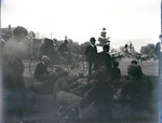 Football team of Pomona College class of 1906 resting on sidelines