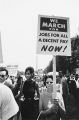Woman marching with "We march for/jobs for all/a decent pay/now!" sign, March on Washington