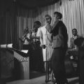 Pauline Sledge and Ray Quarles performing on stage with the Sheiks at the Laicos Club in Montgomery, Alabama.