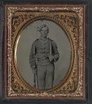 [Unidentified soldier in Confederate uniform with musket and D-guard Bowie knife]