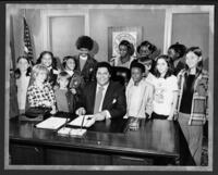 Maynard Jackson at his Desk with Children, 1975