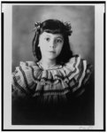 [African American girl, head-and-shoulders portrait, facing front]