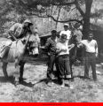 Children with donkeys at camp