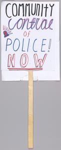 Placard reading "community control of police now" used at Baltimore protests