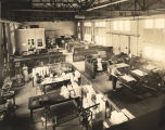 Students and faculty at work in the print shop at Tuskegee Institute in Tuskegee, Alabama.