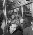 Fred Shuttlesworth and other African Americans waiting to board a bus during an integration attempt in Birmingham, Alabama.