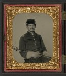 [Unidentified soldier in Union first lieutenant's uniform and gauntlets with field officer's sword]