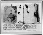 [Photograph of Walter G. Jones, Pvt., 8th New York Cavalry, Co. C., U.S.A., half-length, facing front and his New Testament with bullet holes, and the two bullets which lodged in the book]