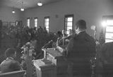 Martin Luther King, Jr., speaking to an audience at Maggie Street Baptist Church in Montgomery, Alabama.