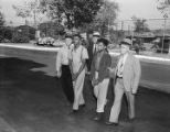 Joe Vernon and L. C. Bell being led to the city jail in Birmingham, Alabama.