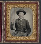 [Unidentified soldier in Confederate uniform with Colt Revolving rifle and D-Guard Bowie knife]