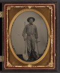 [Unidentified man with gold mining equipment and wearing a U.S. beltplate]