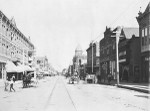 View of San Bernardino's Third Street, showing the Stewart Hotel and other buildings, ca.1900