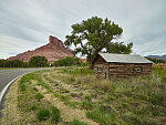 Cabin below The Palisade, a towering red-rock buttress near the town of Gateway in Mesa County, Colorado