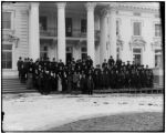 Members of the Southwestern Iowa Editorial Association and officials from the Louisiana Purchase Exposition Company o n the steps of the Iowa pavilion